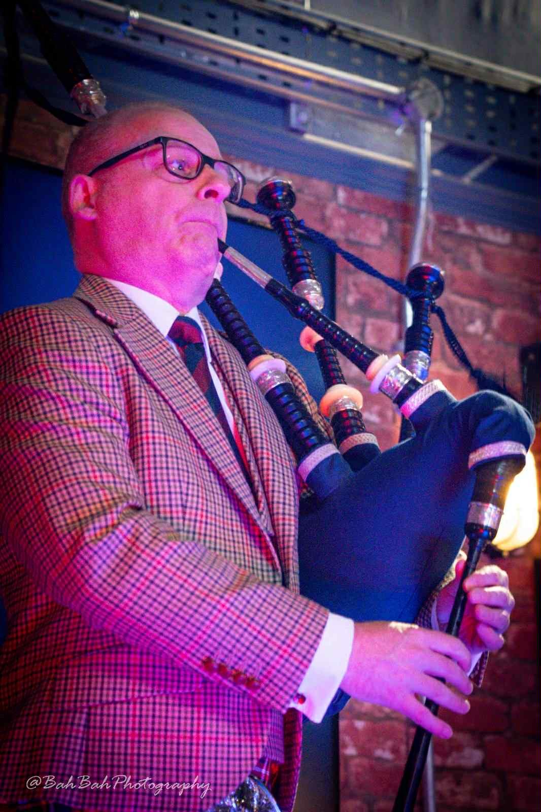 Scott Morton playing the Highland bagpipes